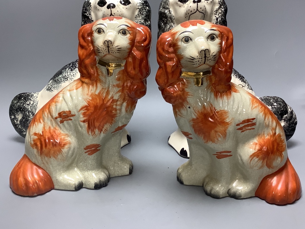 Three pairs of Staffordshire style dogs, tallest 27cm